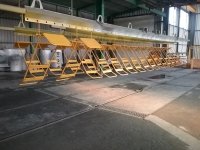 Traitement de surface d'un ensemble de supports de chariot