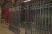 Grenaillage + 1 couche polyzinc + 1 thermolaquage sur grilles et poteaux
